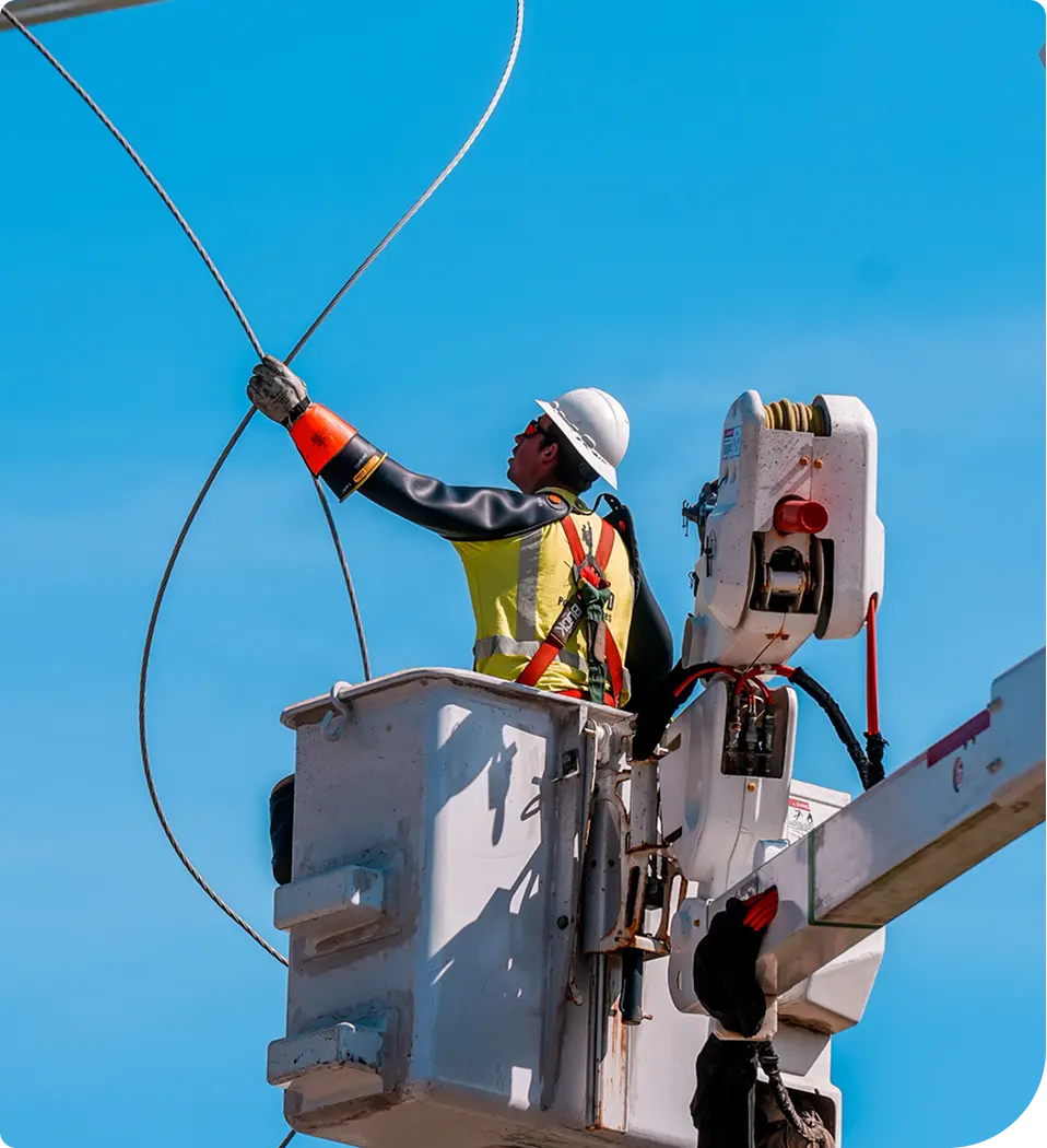PIE&G crew members with a bucket truck